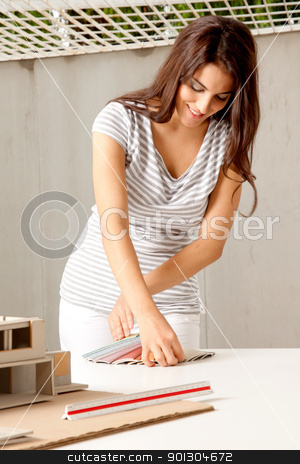 To use this stock image in your creative project, please select the size you need over to the right and click the "Add to Cart" button.
Your downloaded image will come with the Cutcaster watermark removed so don’t worry about the watermark you see on this page. Color Swatch stock photo, A young architect choosing a color swatch for a building by Tyler Olson