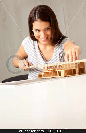 To use this stock image in your creative project, please select the size you need over to the right and click the "Add to Cart" button.
Your downloaded image will come with the Cutcaster watermark removed so don’t worry about the watermark you see on this page. House Design Architect stock photo, A young architect designing and building a model house by Tyler Olson