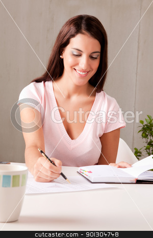To use this stock image in your creative project, please select the size you need over to the right and click the "Add to Cart" button.
Your downloaded image will come with the Cutcaster watermark removed so don’t worry about the watermark you see on this page. Business Plan stock photo, A woman making business plans sitting at a desk by Tyler Olson