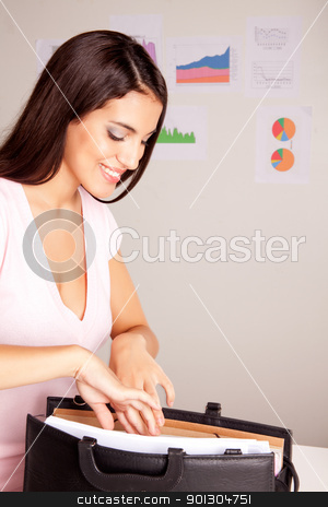 To use this stock image in your creative project, please select the size you need over to the right and click the "Add to Cart" button.
Your downloaded image will come with the Cutcaster watermark removed so don’t worry about the watermark you see on this page. Business Presentation stock photo, A pretty business woman preparing for a presentation by Tyler Olson