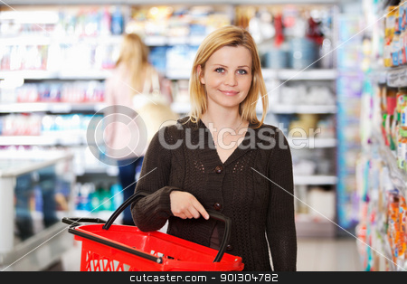 To use this stock image in your creative project, please select the size you need over to the right and click the "Add to Cart" button.
Your downloaded image will come with the Cutcaster watermark removed so don’t worry about the watermark you see on this page. Grocery Store Portrait stock photo, Portrait of a young woman carrying basket while shopping in the supermarket by Tyler Olson