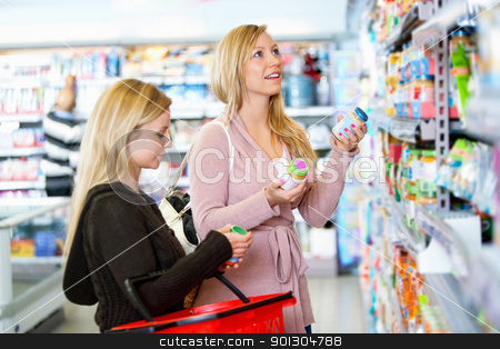 To use this stock image in your creative project, please select the size you need over to the right and click the "Add to Cart" button.
Your downloaded image will come with the Cutcaster watermark removed so don’t worry about the watermark you see on this page. Product Comparison stock photo, Young women shopping together in the supermarket with people in the background by Tyler Olson