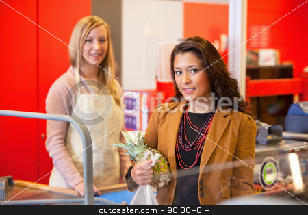 To use this stock image in your creative project, please select the size you need over to the right and click the "Add to Cart" button.
Your downloaded image will come with the Cutcaster watermark removed so don’t worry about the watermark you see on this page. Supermarket Store Customer stock photo, Portrait of a customer holding pineapple with shop assistant in the background by Tyler Olson
