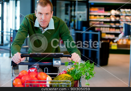 To use this stock image in your creative project, please select the size you need over to the right and click the "Add to Cart" button.
Your downloaded image will come with the Cutcaster watermark removed so don’t worry about the watermark you see on this page. Portrait of a Man in Supermarket stock photo, Portrait of a man pushing a grocery cart in a supermarket by Tyler Olson