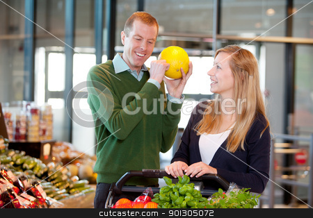 To use this stock image in your creative project, please select the size you need over to the right and click the "Add to Cart" button.
Your downloaded image will come with the Cutcaster watermark removed so don’t worry about the watermark you see on this page. Man Checking Ripeness of Melon stock photo, A man knocking on a melon to check if it is ripe by Tyler Olson
