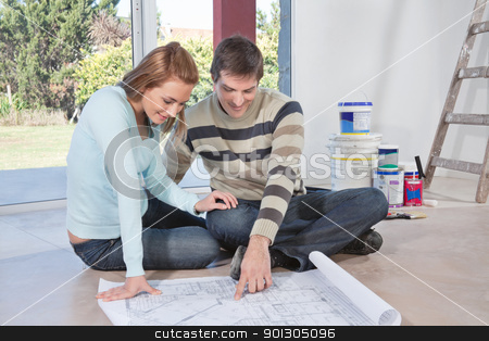 To use this stock image in your creative project, please select the size you need over to the right and click the "Add to Cart" button.
Your downloaded image will come with the Cutcaster watermark removed so don’t worry about the watermark you see on this page. Man showing blueprint of their new house to his wife stock photo, Mature man showing blueprint of their new house to his wife by Tyler Olson