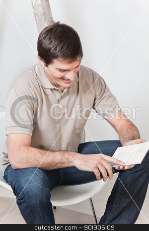 To use this stock image in your creative project, please select the size you need over to the right and click the "Add to Cart" button.
Your downloaded image will come with the Cutcaster watermark removed so don’t worry about the watermark you see on this page. Young Man with Color Swatch stock photo, Young attractive man looking at color guide and smiling by Tyler Olson