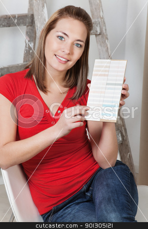 To use this stock image in your creative project, please select the size you need over to the right and click the "Add to Cart" button.
Your downloaded image will come with the Cutcaster watermark removed so don’t worry about the watermark you see on this page. Woman pointing at color sample stock photo, Portrait of a young beautiful woman pointing at color sample by Tyler Olson