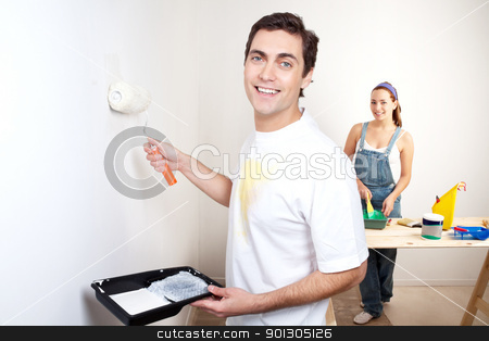 To use this stock image in your creative project, please select the size you need over to the right and click the "Add to Cart" button.
Your downloaded image will come with the Cutcaster watermark removed so don’t worry about the watermark you see on this page. Smiling man painting the wall of his new apartment stock photo, Portrait of smiling man painting the wall with woman standing in the background by Tyler Olson