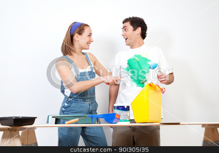 To use this stock image in your creative project, please select the size you need over to the right and click the "Add to Cart" button.
Your downloaded image will come with the Cutcaster watermark removed so don’t worry about the watermark you see on this page. Happy woman having fun coloring her boyfriend's shirt stock photo, Happy Caucasian woman having fun coloring her boyfriend's shirt by Tyler Olson