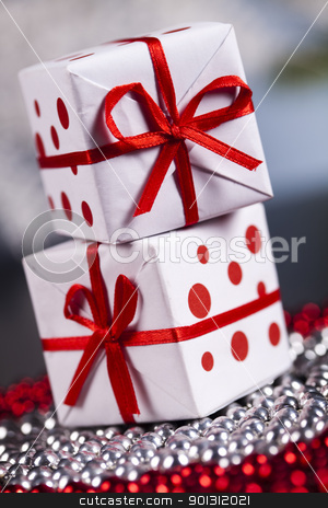 To use this stock image in your creative project, please select the size you need over to the right and click the "Add to Cart" button.
Your downloaded image will come with the Cutcaster watermark removed so don’t worry about the watermark you see on this page. Christmas gifts stock photo, Photography of baubles and gift connected with Christmas time and Christmas tree. by Sebastian Duda