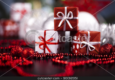 To use this stock image in your creative project, please select the size you need over to the right and click the "Add to Cart" button.
Your downloaded image will come with the Cutcaster watermark removed so don’t worry about the watermark you see on this page. Christmas gifts stock photo, Photography of baubles and gift connected with Christmas time and Christmas tree. by Sebastian Duda