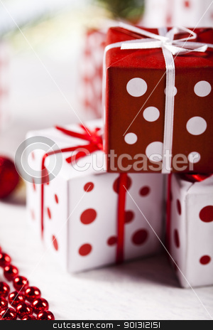 To use this stock image in your creative project, please select the size you need over to the right and click the "Add to Cart" button.
Your downloaded image will come with the Cutcaster watermark removed so don’t worry about the watermark you see on this page. Christmas gifts stock photo, Photography of baubles and gift connected with Christmas time and Christmas tree. by Sebastian Duda