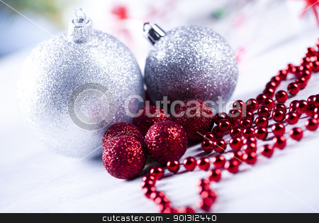 To use this stock image in your creative project, please select the size you need over to the right and click the "Add to Cart" button.
Your downloaded image will come with the Cutcaster watermark removed so don’t worry about the watermark you see on this page. Shiny Baubles & Christmas stock photo, Photography of baubles and gift connected with Christmas time and Christmas tree. by Sebastian Duda