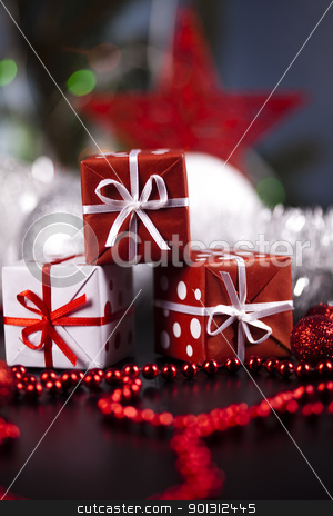 To use this stock image in your creative project, please select the size you need over to the right and click the "Add to Cart" button.
Your downloaded image will come with the Cutcaster watermark removed so don’t worry about the watermark you see on this page. Gifts background stock photo, Photography of baubles and gift connected with Christmas time and Christmas tree. by Sebastian Duda