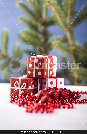To use this stock image in your creative project, please select the size you need over to the right and click the "Add to Cart" button.
Your downloaded image will come with the Cutcaster watermark removed so don’t worry about the watermark you see on this page. Christmas gifts stock photo, Photography of baubles and gift connected with Christmas time and Christmas tree. by Sebastian Duda