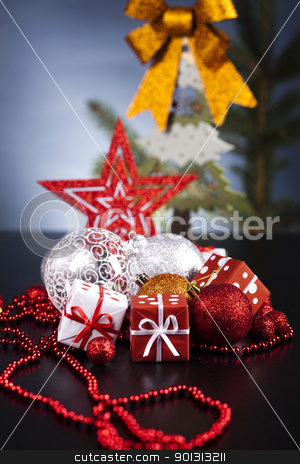 To use this stock image in your creative project, please select the size you need over to the right and click the "Add to Cart" button.
Your downloaded image will come with the Cutcaster watermark removed so don’t worry about the watermark you see on this page. Cut spruce and Christmas balls stock photo, Photography of baubles and gift connected with Christmas time and Christmas tree. by Sebastian Duda