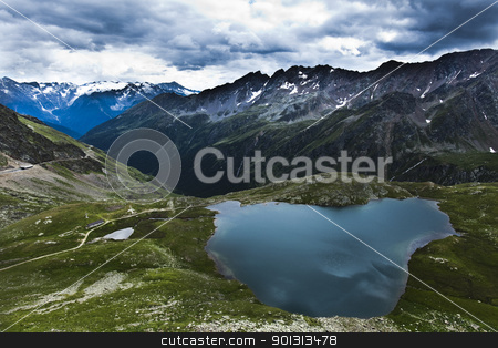 To use this stock image in your creative project, please select the size you need over to the right and click the "Add to Cart" button.
Your downloaded image will come with the Cutcaster watermark removed so don’t worry about the watermark you see on this page. Mountain stock photo, Mountain top under the blue sky with clouds. by Sebastian Duda