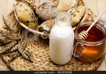 To use this stock image in your creative project, please select the size you need over to the right and click the "Add to Cart" button.
Your downloaded image will come with the Cutcaster watermark removed so don’t worry about the watermark you see on this page. Compositions bread stock photo, Still-life assortment of baked bread. by Sebastian Duda