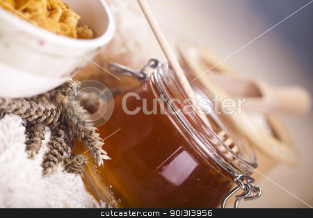To use this stock image in your creative project, please select the size you need over to the right and click the "Add to Cart" button.
Your downloaded image will come with the Cutcaster watermark removed so don’t worry about the watermark you see on this page. Honey stock photo, Still-life assortment of breakfast. by Sebastian Duda