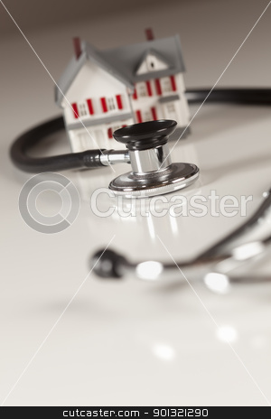 To use this stock image in your creative project, please select the size you need over to the right and click the "Add to Cart" button.
Your downloaded image will come with the Cutcaster watermark removed so don’t worry about the watermark you see on this page. Stethoscope with Small Model Home stock photo, Stethoscope and Model House on Gradated Background with Selective Focus. by Andy Dean