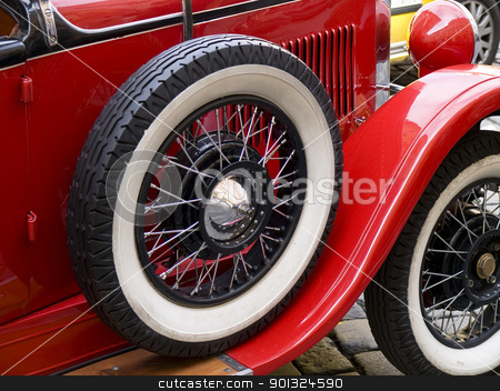 To use this stock image in your creative project, please select the size you need over to the right and click the "Add to Cart" button.
Your downloaded image will come with the Cutcaster watermark removed so don’t worry about the watermark you see on this page. old car tyre stock photo, old classic car wheels and tyres by nevenm