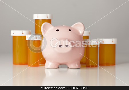 To use this stock image in your creative project, please select the size you need over to the right and click the "Add to Cart" button.
Your downloaded image will come with the Cutcaster watermark removed so don’t worry about the watermark you see on this page. Piggy Bank In Front of Several Medicine Bottles stock photo, Piggy Bank In Front of Several Medicine Bottles on a Gradated Background. by Andy Dean