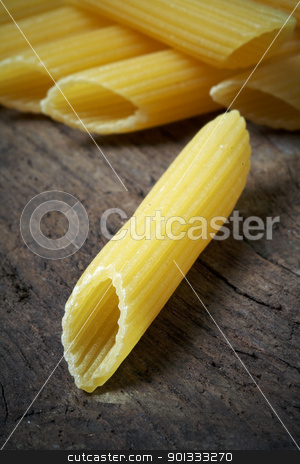 To use this stock image in your creative project, please select the size you need over to the right and click the "Add to Cart" button.
Your downloaded image will come with the Cutcaster watermark removed so don’t worry about the watermark you see on this page. Italian raw pasta stock photo, close up of Italian raw pasta on wood by maxg71