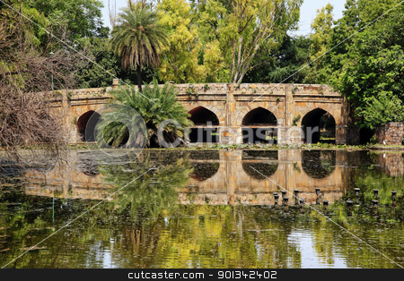 To use this stock image in your creative project, please select the size you need over to the right and click the "Add to Cart" button.
Your downloaded image will come with the Cutcaster watermark removed so don’t worry about the watermark you see on this page. Athpula Stone Bridge Reflection Lodi Gardens New Delhi India stock photo, Athpula Eight Piers Stone Bridge Reflection Lodi Gardens New Delhi India 17th Century Bridge by William Perry