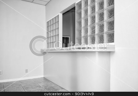 To use this stock image in your creative project, please select the size you need over to the right and click the "Add to Cart" button.
Your downloaded image will come with the Cutcaster watermark removed so don’t worry about the watermark you see on this page. reception window stock photo, view of glass block reception window in empty office building by Stephen Orsillo