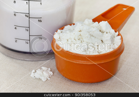To use this stock image in your creative project, please select the size you need over to the right and click the "Add to Cart" button.
Your downloaded image will come with the Cutcaster watermark removed so don’t worry about the watermark you see on this page. whey protein and almond milk stock photo, a scoop of whey protein isolate powder and almond milk in a plastic blender beaker by Marek Uliasz