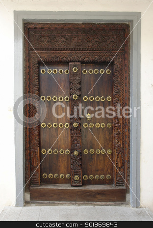To use this stock image in your creative project, please select the size you need over to the right and click the "Add to Cart" button.
Your downloaded image will come with the Cutcaster watermark removed so don’t worry about the watermark you see on this page. ornamented door in Africa stock photo, door in Stone Town (Zanzibar) by prill