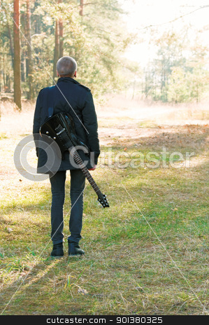 To use this stock image in your creative project, please select the size you need over to the right and click the "Add to Cart" button.
Your downloaded image will come with the Cutcaster watermark removed so don’t worry about the watermark you see on this page. musician stock photo, teen musician with a guitar in the autumn forest by Salauyou Yury