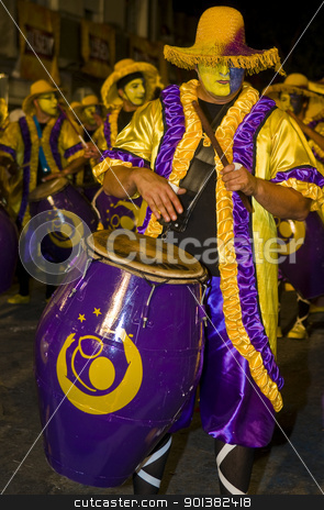 To use this stock image in your creative project, please select the size you need over to the right and click the "Add to Cart" button.
Your downloaded image will come with the Cutcaster watermark removed so don’t worry about the watermark you see on this page. Candombe stock photo, MONTEVIDEO,URUGUAY-FEBRUARY 5 2011: Candombe drummers in the Montevideo annual Carnaval , Candombe is a drum-based musical style of Uruguay. Candombe originated among the African population in Montevideo Uruguay by Kobby Dagan