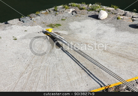 To use this stock image in your creative project, please select the size you need over to the right and click the "Add to Cart" button.
Your downloaded image will come with the Cutcaster watermark removed so don’t worry about the watermark you see on this page. Rope for mooring a boat to a pier stock photo, Rope for mooring a boat to a pier by Chretien