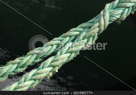 To use this stock image in your creative project, please select the size you need over to the right and click the "Add to Cart" button.
Your downloaded image will come with the Cutcaster watermark removed so don’t worry about the watermark you see on this page. Rope for mooring a boat to a pier stock photo, Rope for mooring a boat to a pier by Chretien