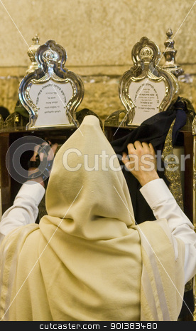 To use this stock image in your creative project, please select the size you need over to the right and click the "Add to Cart" button.
Your downloaded image will come with the Cutcaster watermark removed so don’t worry about the watermark you see on this page. Prayer in the Wailing wall stock photo, Prayer in the Wailing wall in old Jerusalem , Israel by Kobby Dagan
