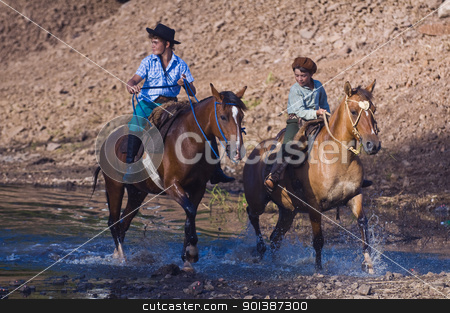 To use this stock image in your creative project, please select the size you need over to the right and click the "Add to Cart" button.
Your downloaded image will come with the Cutcaster watermark removed so don’t worry about the watermark you see on this page. Gaucho festival stock photo, TACUAREMBO, URUGUAY - MAR 5 : Participant in the annual festival