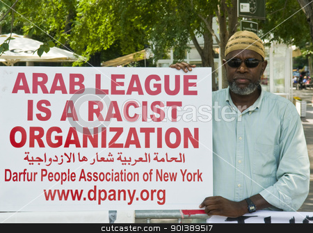 To use this stock image in your creative project, please select the size you need over to the right and click the "Add to Cart" button.
Your downloaded image will come with the Cutcaster watermark removed so don’t worry about the watermark you see on this page. Sudan demonstration stock photo, NEW YORK - JUNE 27 2011 : Unitentified participant in a demonstration against the government of Sudan in front of the UN offices in New York city on June 27 2011 by Kobby Dagan