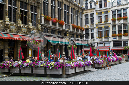 To use this stock image in your creative project, please select the size you need over to the right and click the "Add to Cart" button.
Your downloaded image will come with the Cutcaster watermark removed so don’t worry about the watermark you see on this page. Grand place - Brussels stock photo, BRUSSELS - JULY 2 : Unidentified people seat in a cafe at Grand place Brussels , Belgium on July 2 2011 , Grand place is