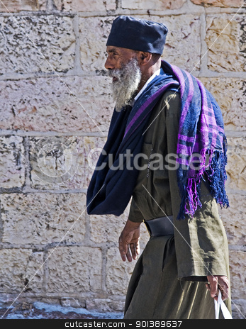 To use this stock image in your creative project, please select the size you need over to the right and click the "Add to Cart" button.
Your downloaded image will come with the Cutcaster watermark removed so don’t worry about the watermark you see on this page. Ethiopian priest stock photo, Ethiopian priest walking near the Westren wall in Jerusalem by Kobby Dagan