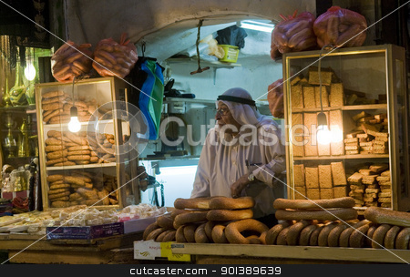 To use this stock image in your creative project, please select the size you need over to the right and click the "Add to Cart" button.
Your downloaded image will come with the Cutcaster watermark removed so don’t worry about the watermark you see on this page. Palestinian bread seller stock photo, JERUSALEM - OCTOBER 06 2011 : Palestinian bread seller in the old city of Jerusalem , Israel by Kobby Dagan