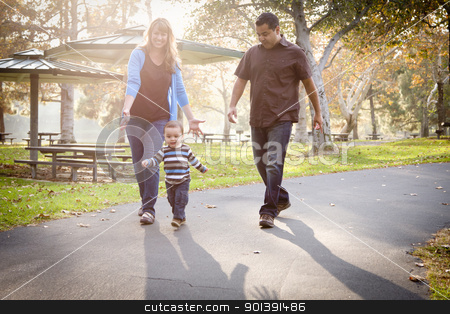 To use this stock image in your creative project, please select the size you need over to the right and click the "Add to Cart" button.
Your downloaded image will come with the Cutcaster watermark removed so don’t worry about the watermark you see on this page. Happy Mixed Race Ethnic Family Walking In The Park stock photo, Happy Young Mixed Race Ethnic Family Walking In The Park. by Andy Dean