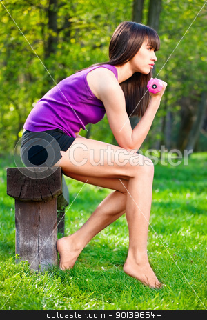To use this stock image in your creative project, please select the size you need over to the right and click the "Add to Cart" button.
Your downloaded image will come with the Cutcaster watermark removed so don’t worry about the watermark you see on this page. woman doing fitness exercises outdoors stock photo, Young brunette woman doing fitness exercises outdoors by iMarin