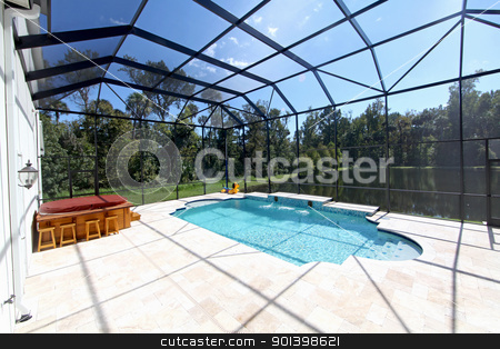 To use this stock image in your creative project, please select the size you need over to the right and click the "Add to Cart" button.
Your downloaded image will come with the Cutcaster watermark removed so don’t worry about the watermark you see on this page. Swimming Pool with Lake View stock photo, A Swimming Pool and Hot Tub with Lake View. by Lucy Clark