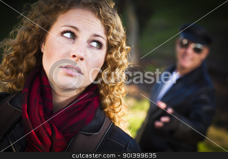 To use this stock image in your creative project, please select the size you need over to the right and click the "Add to Cart" button.
Your downloaded image will come with the Cutcaster watermark removed so don’t worry about the watermark you see on this page. Pretty Young Teen Girl with Man Lurking Behind Her stock photo, Pretty Young Teen Girl with Mysterious Strange Man Lurking Behind Her. by Andy Dean