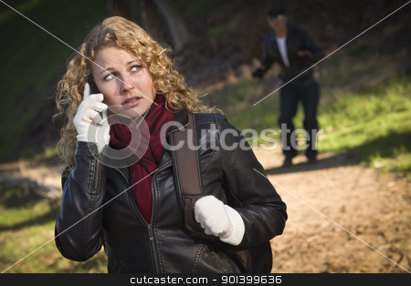 To use this stock image in your creative project, please select the size you need over to the right and click the "Add to Cart" button.
Your downloaded image will come with the Cutcaster watermark removed so don’t worry about the watermark you see on this page. Pretty Young Teen Girl Walking with Man Lurking Behind Her stock photo, Pretty Young Teen Girl Calling on Cell Phone with Mysterious Strange Man Lurking Behind Her. by Andy Dean