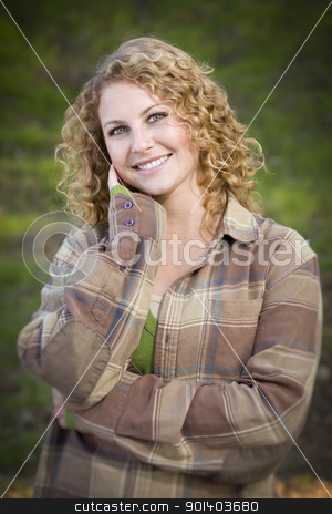 To use this stock image in your creative project, please select the size you need over to the right and click the "Add to Cart" button.
Your downloaded image will come with the Cutcaster watermark removed so don’t worry about the watermark you see on this page. Pretty Young Smiling Woman Portrait stock photo, Pretty Young Smiling Woman Outdoor Portrait. by Andy Dean