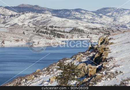 To use this stock image in your creative project, please select the size you need over to the right and click the "Add to Cart" button.
Your downloaded image will come with the Cutcaster watermark removed so don’t worry about the watermark you see on this page. mountain lake in winter scenery stock photo, Horsetooth REservoir in Fort Collins, Colorado with a view of Lory State Park and Greyrock - winter scenery with fresh snow by Marek Uliasz