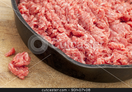 To use this stock image in your creative project, please select the size you need over to the right and click the "Add to Cart" button.
Your downloaded image will come with the Cutcaster watermark removed so don’t worry about the watermark you see on this page. raw ground bison (buffalo) meat stock photo, raw ground bison (buffalo) meat on an iron pan against wood surface by Marek Uliasz